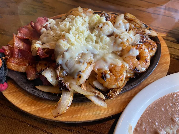 Sizzling skewers with cheese and bacon at El Dorado Mexican Restaurant